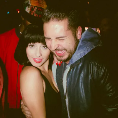 couple with man laughing and woman looking at the camera after some dirty talk